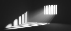 Light behind prison cell bars. Jail punishment and imprisonment